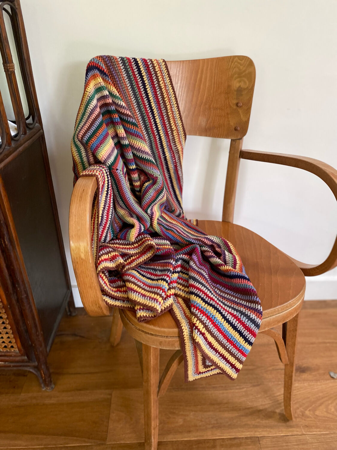 Hand crocheted wool blanket plaid