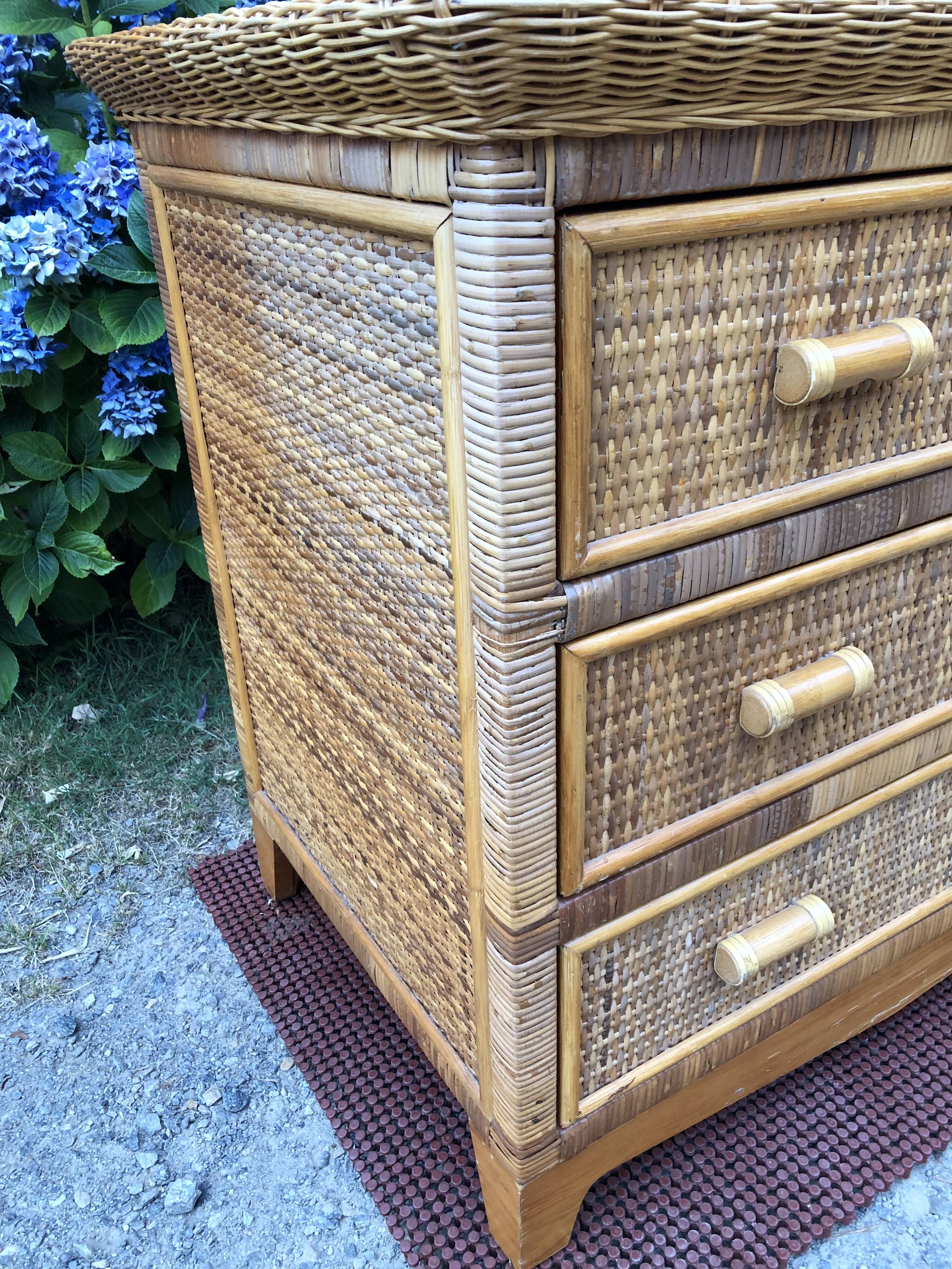 Vintage rattan chest of drawers has 3 drawers.