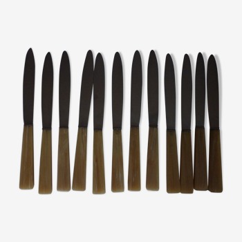 12 bakelite sleeve knives, steel blades