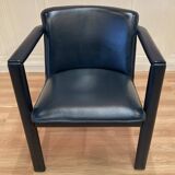 Set of 4 designer leather and metal armchairs.