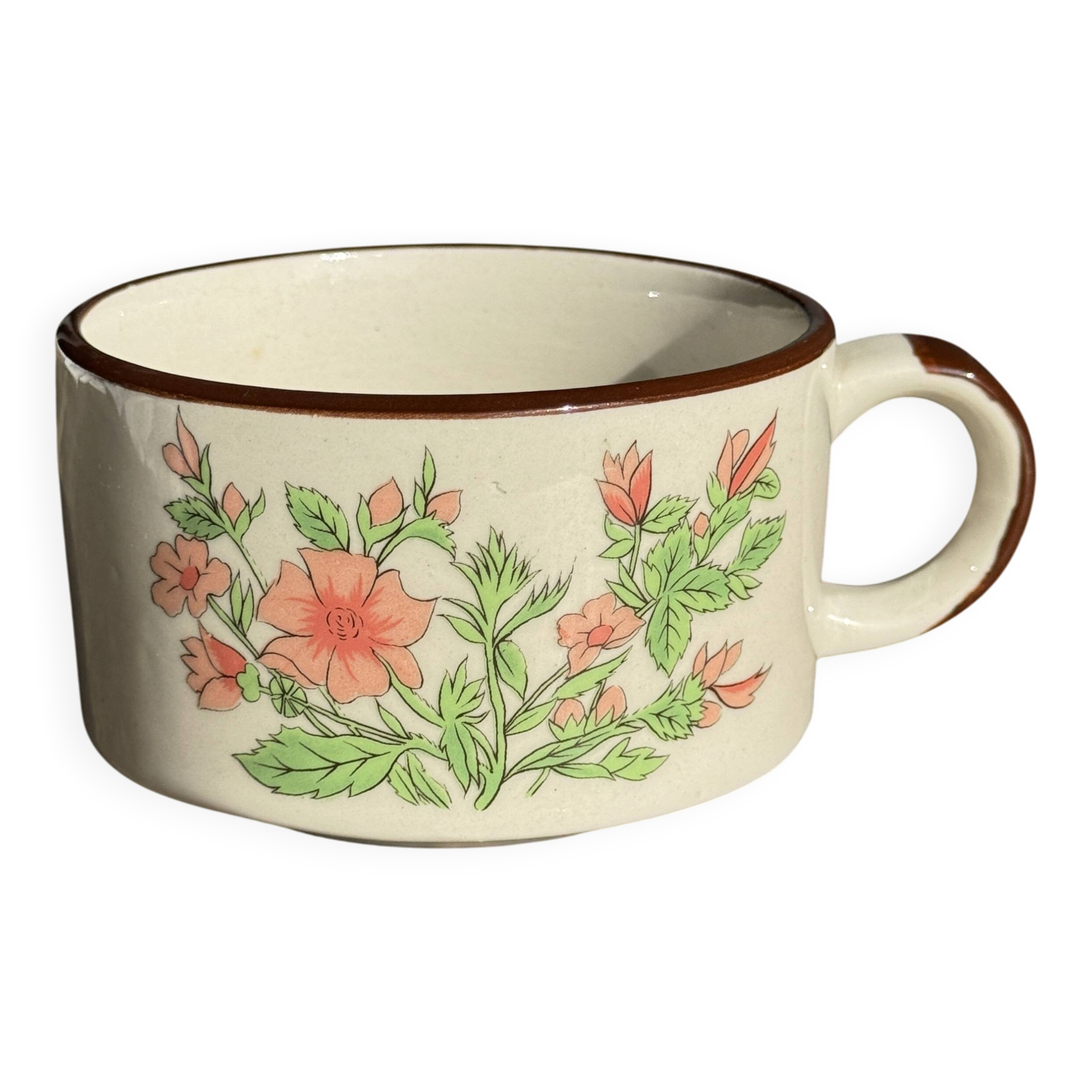 Small speckled stoneware cup made in Korea with a floral pattern H7 D11