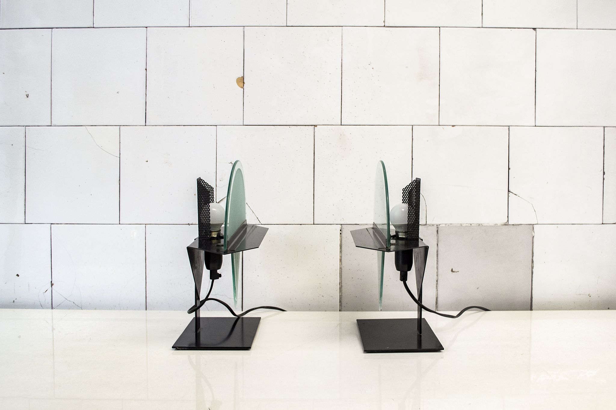 Pair of postmodern lamps with iron structure and lampshade in satin glass Italy 80s