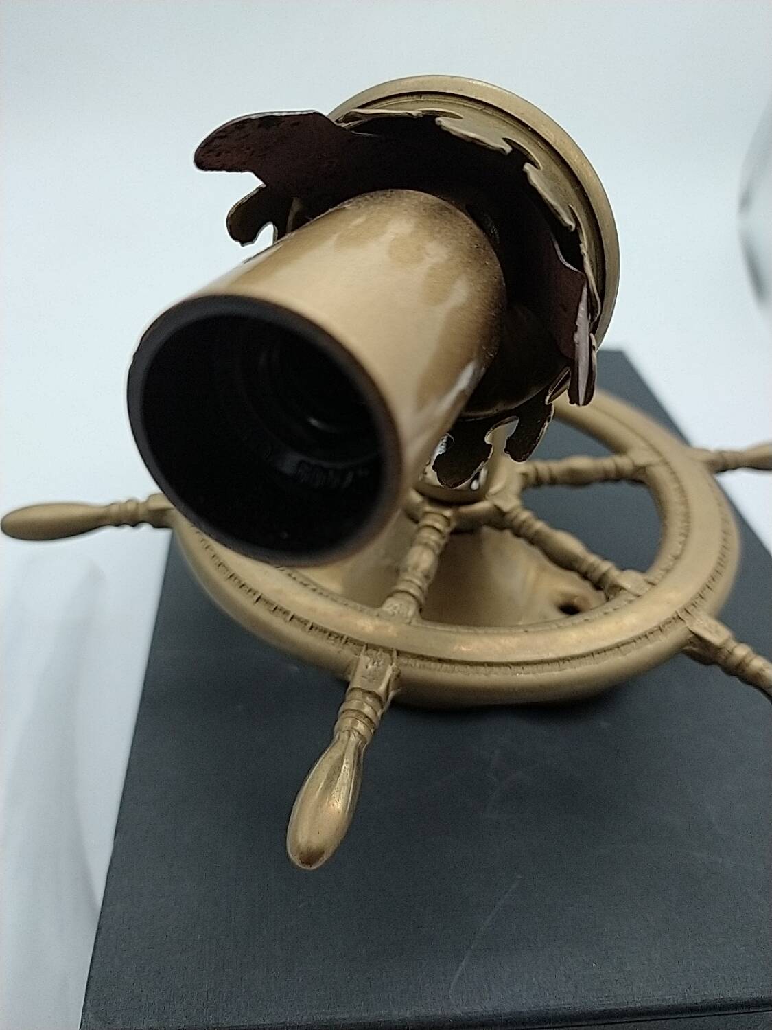 Brass wall sconces with nautical decor