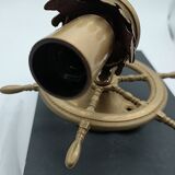 Brass wall sconces with nautical decor