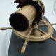 Brass wall sconces with nautical decor