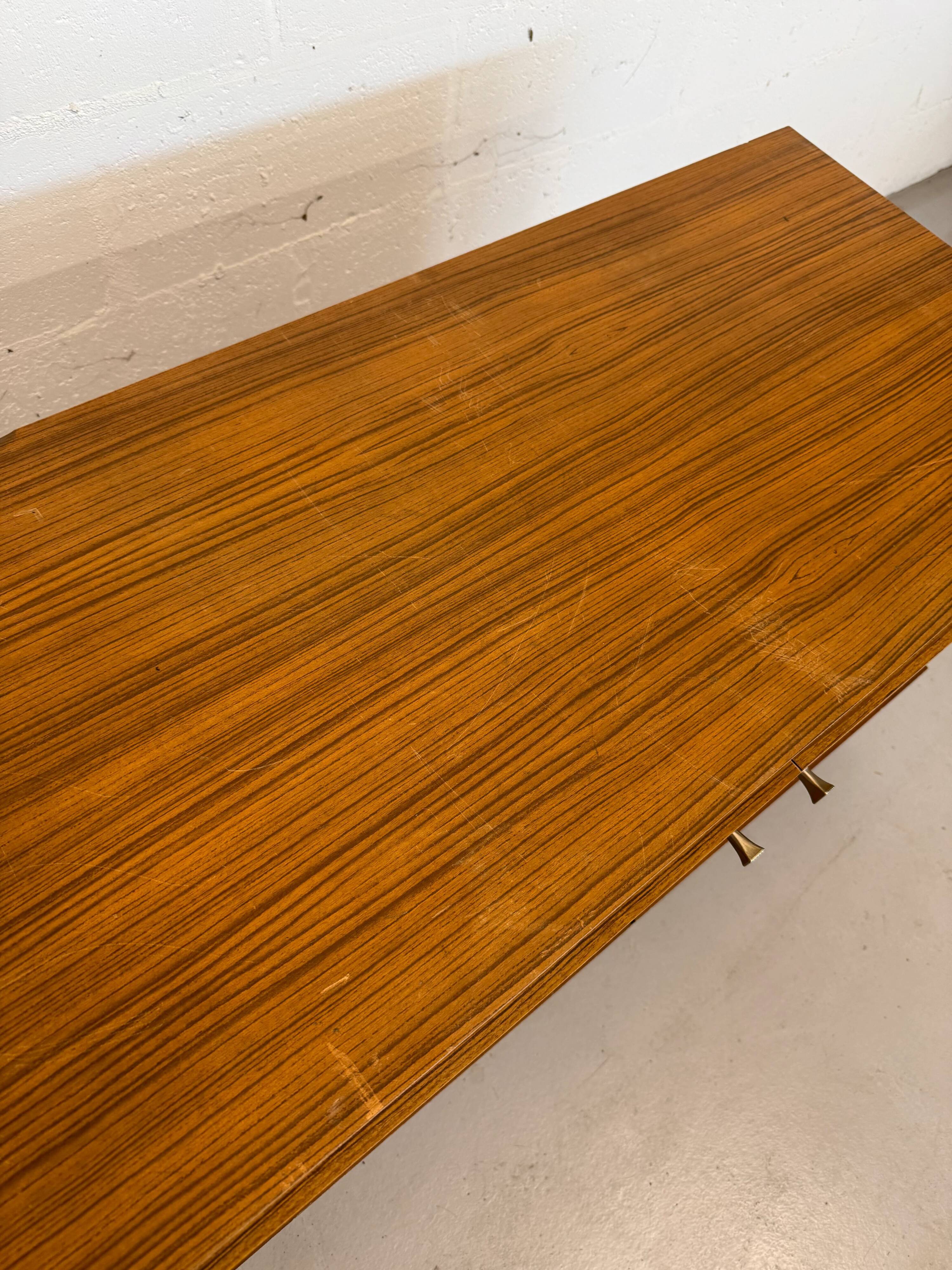 Vintage teak sideboard, mid-century style, with doors and drawers.