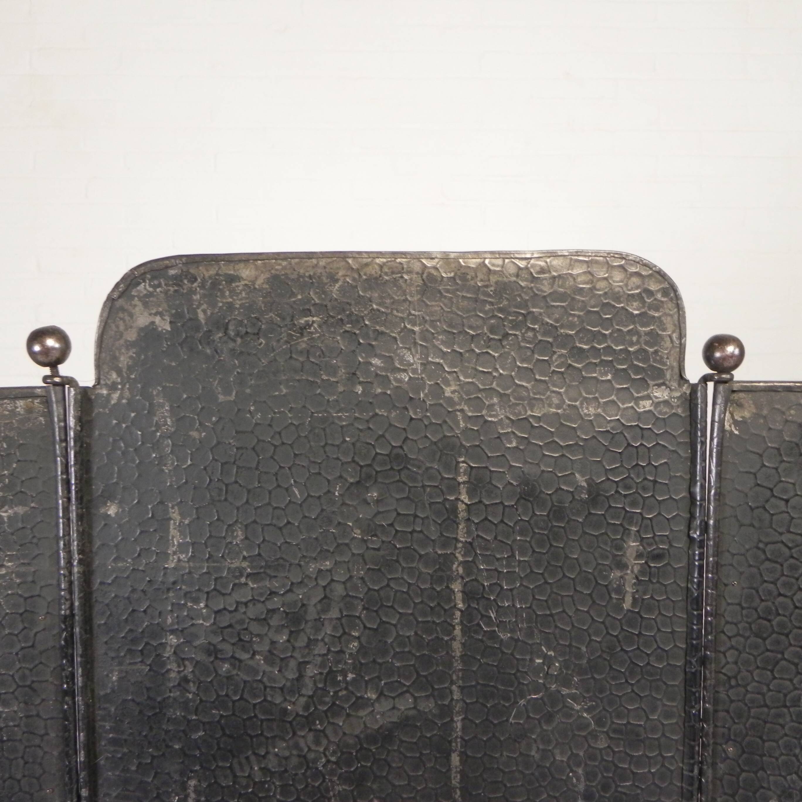 Art Deco screen in steel with brass details, 1930s.
