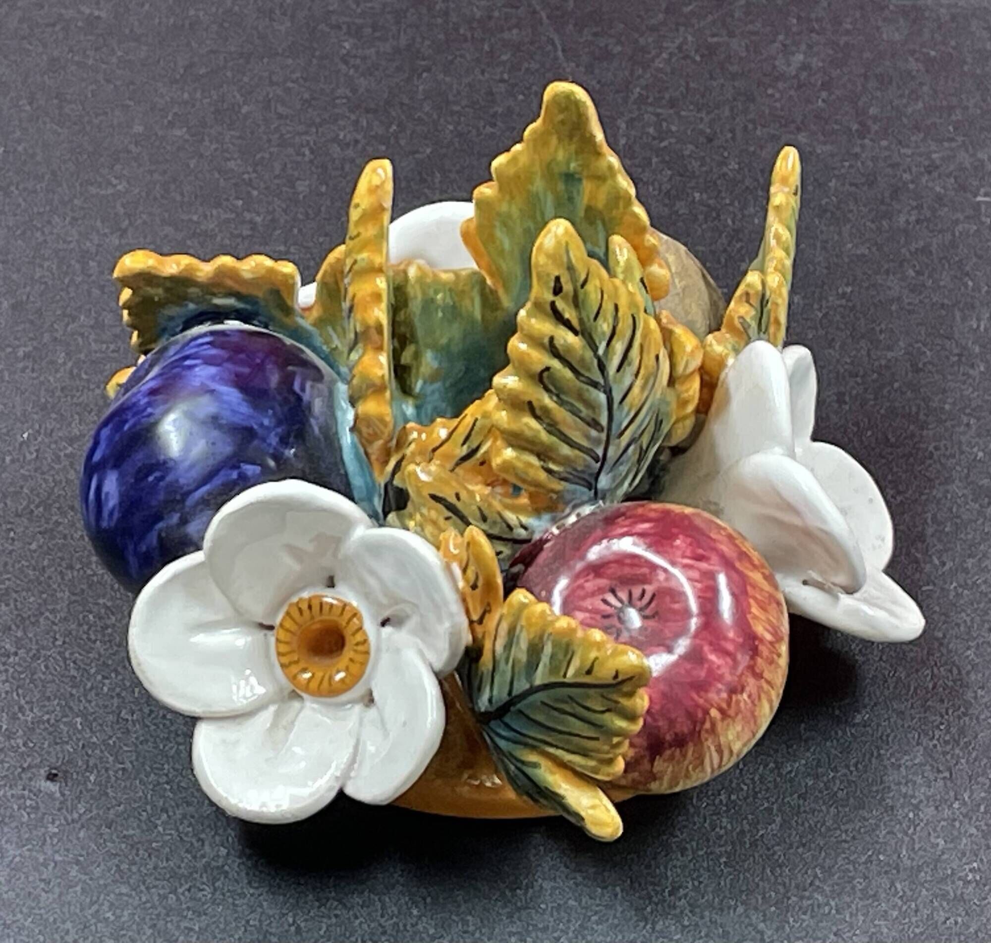 Candlestick with flowers and fruits in slip, Malicorne ceramic