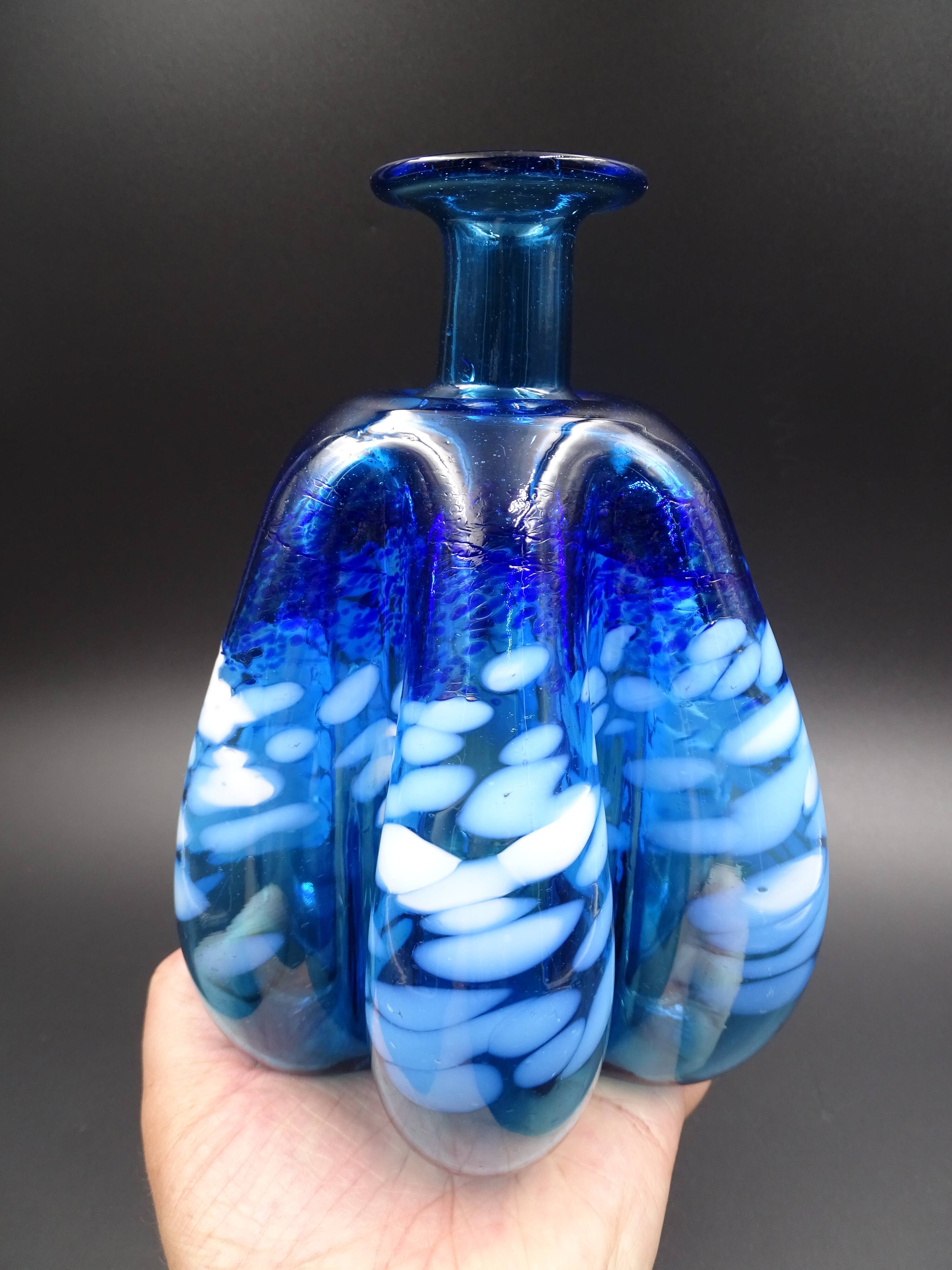 Blue glass vase and touches of white