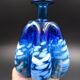Blue glass vase and touches of white