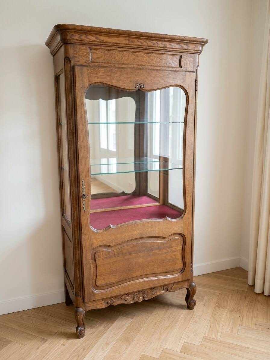 Vintage wooden display cabinet with glass shelves.