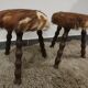 Duo of cowhide stools