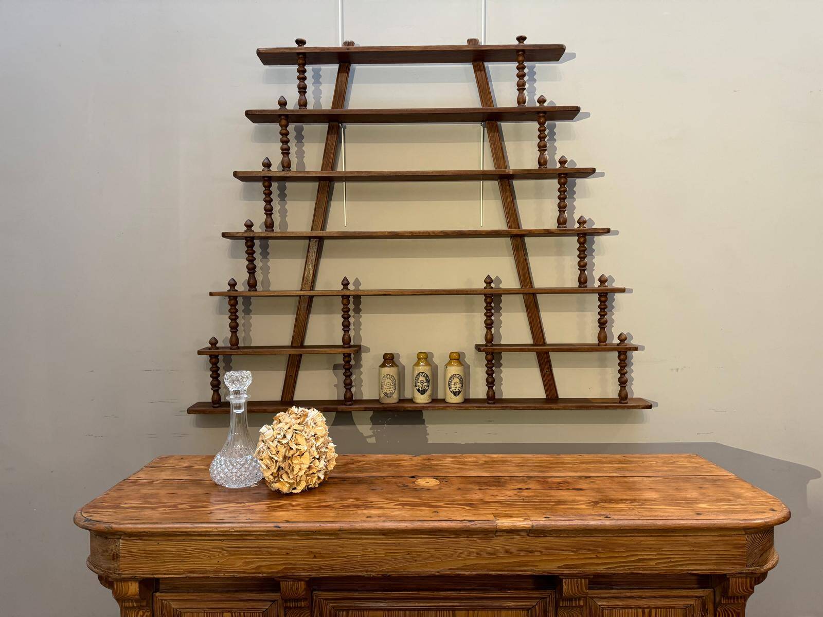 Turned wood bar wall shelf