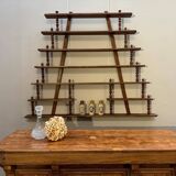 Turned wood bar wall shelf