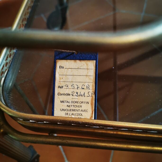 Golden metal serving trolley