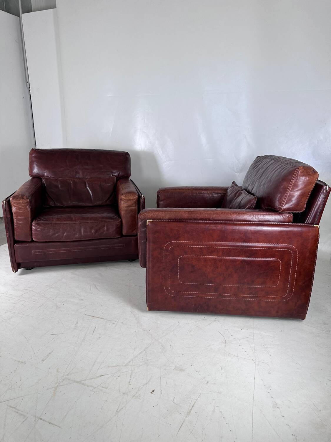 Pair of leather armchairs Roche Bobois