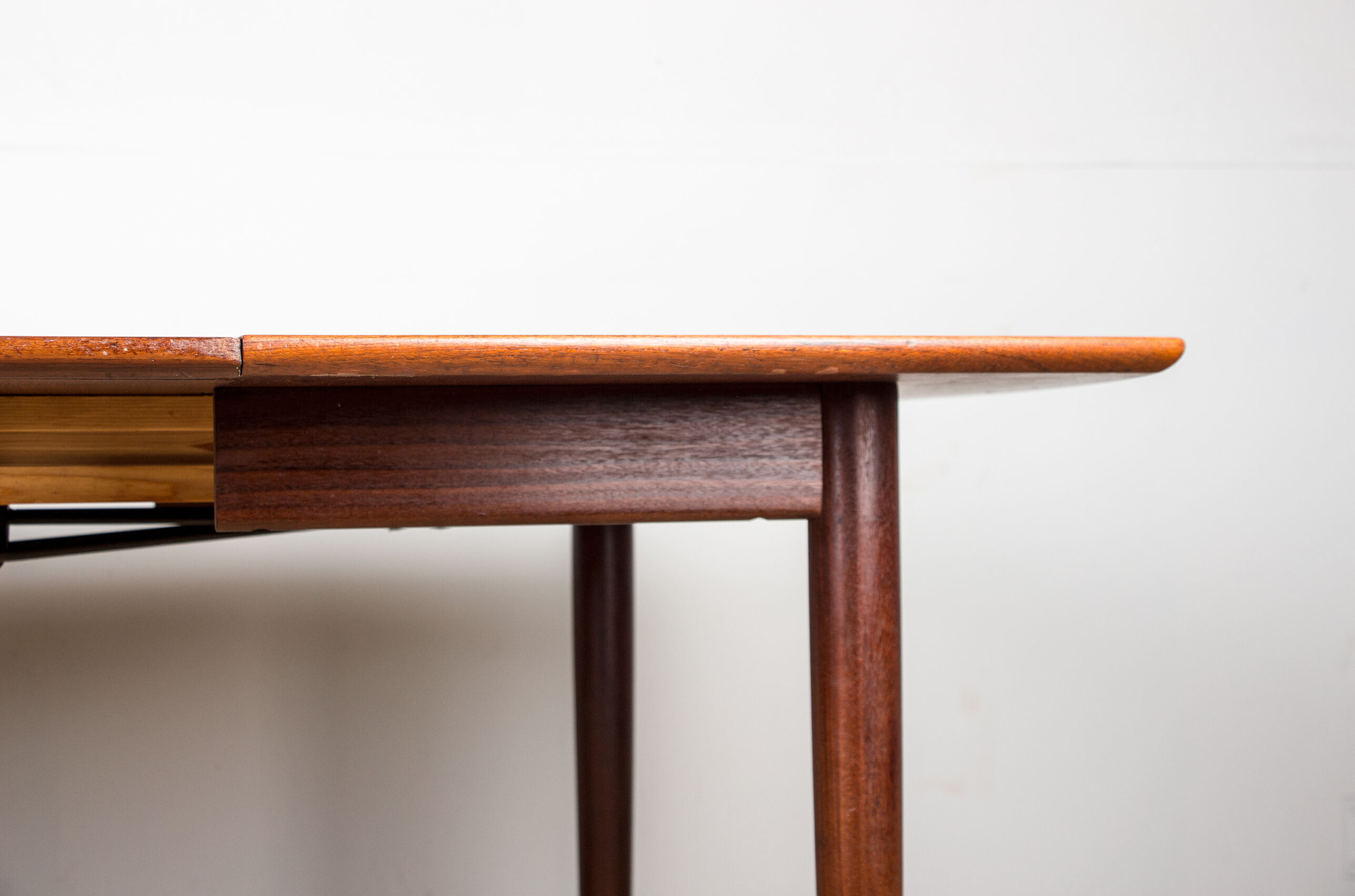 Expandable square teak dining table by Henry Walter Klein 1960