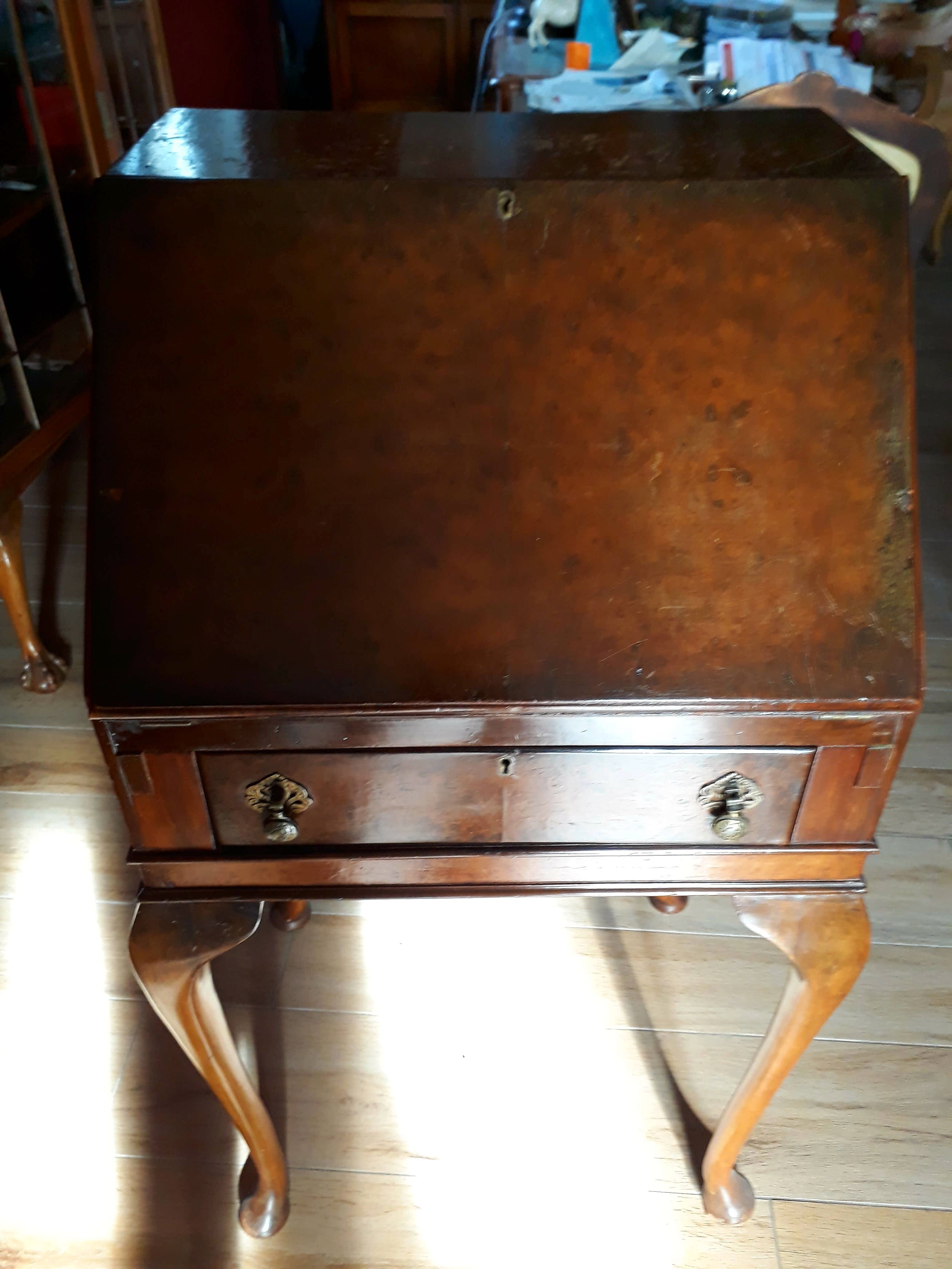 Antique secretary with drop-leaf flap