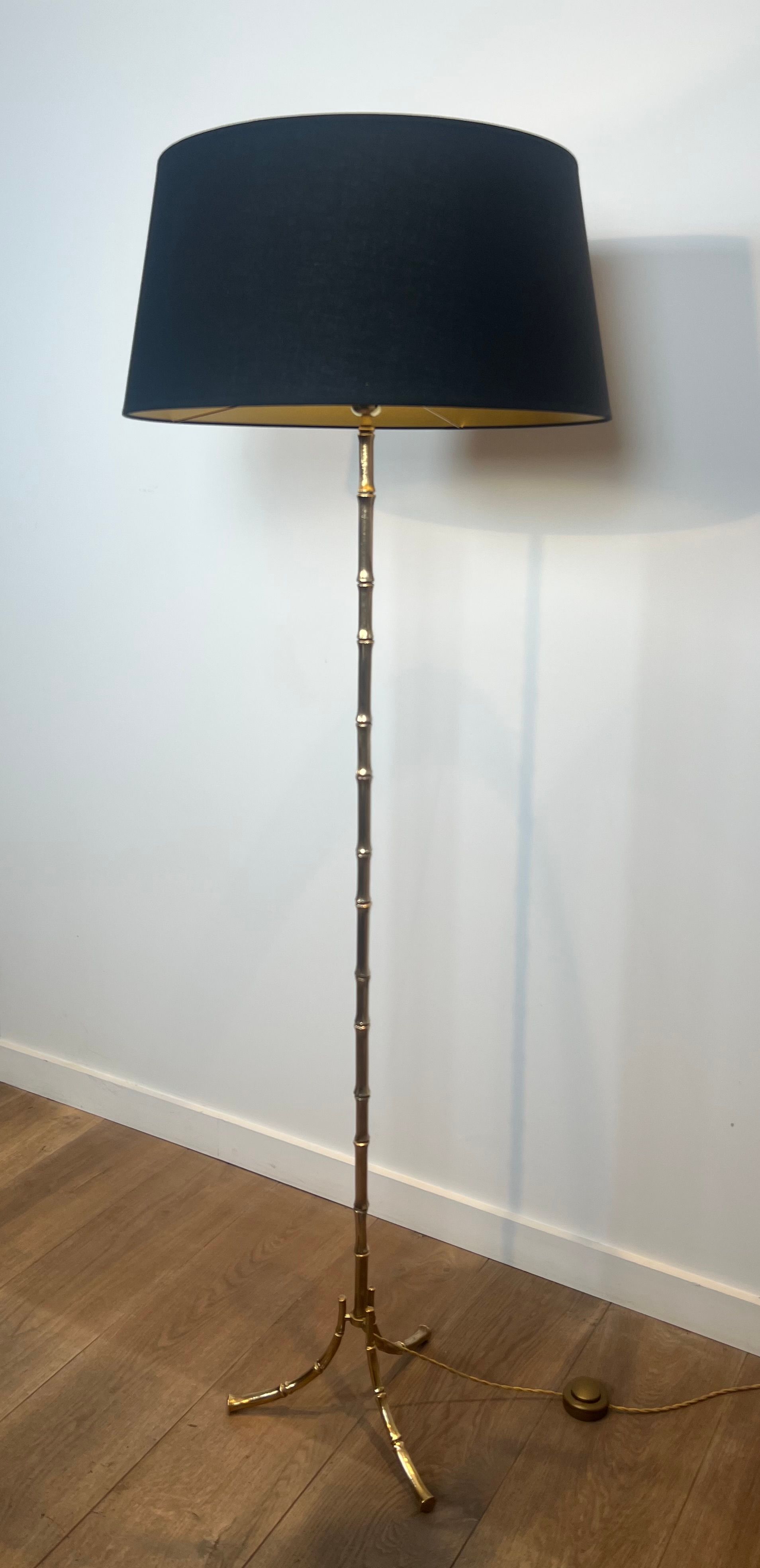 Bronze floor lamp in faux-bamboo style by the Baguès house.