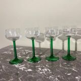 4 green stemmed glasses