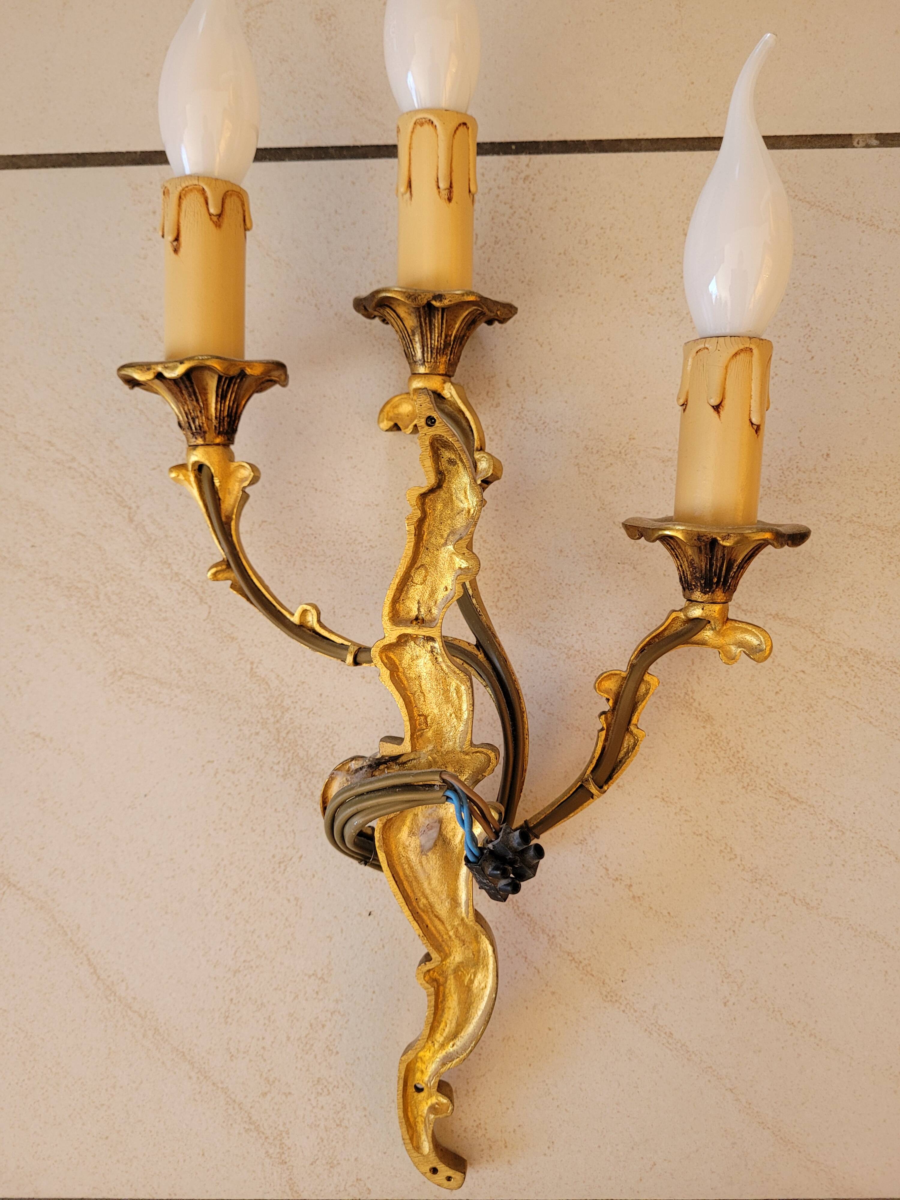 2 gilded bronze wall lights