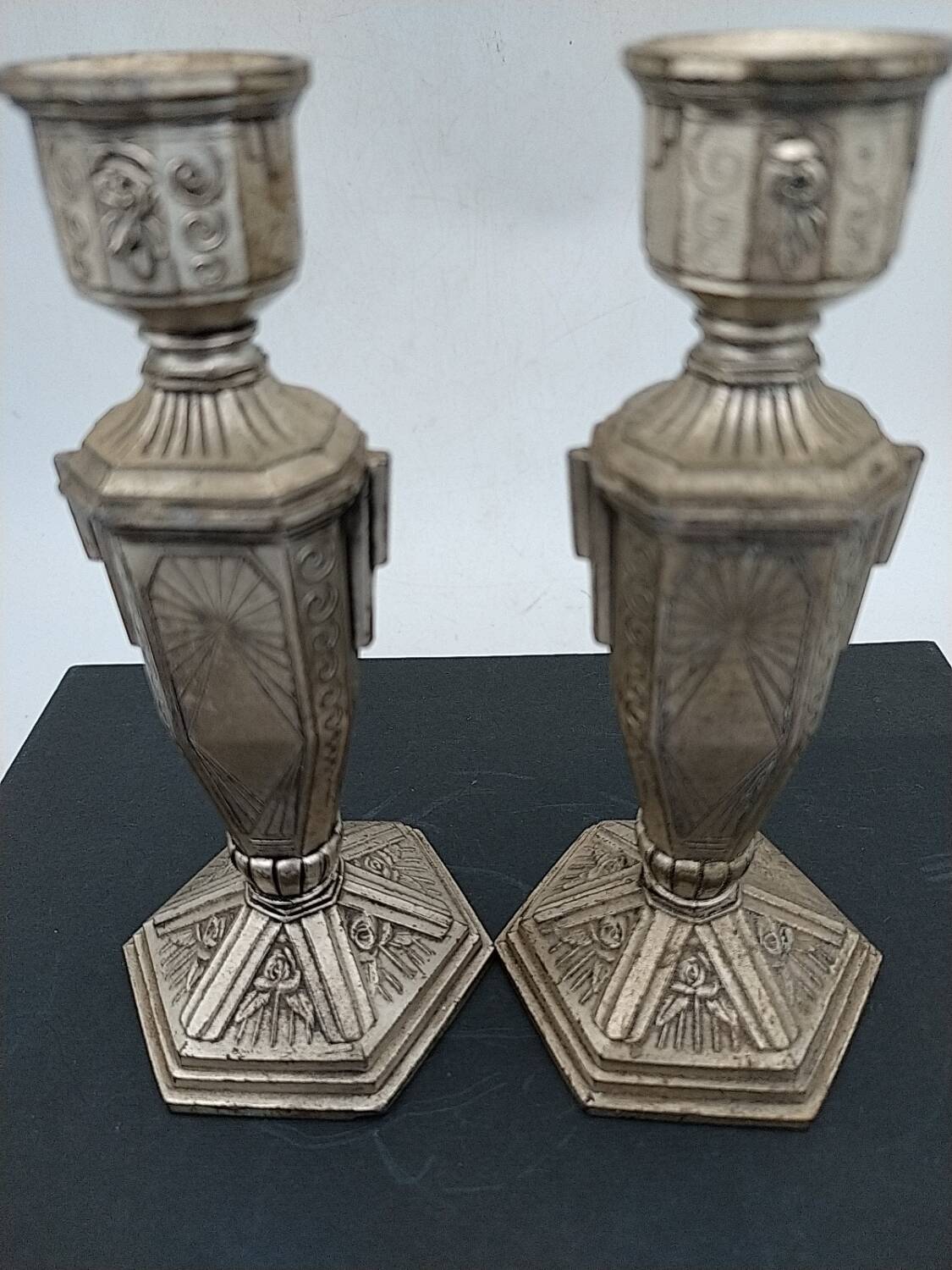 Art Deco metal candle holders.