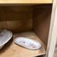 Small one-door Art Deco cabinet with a patina.