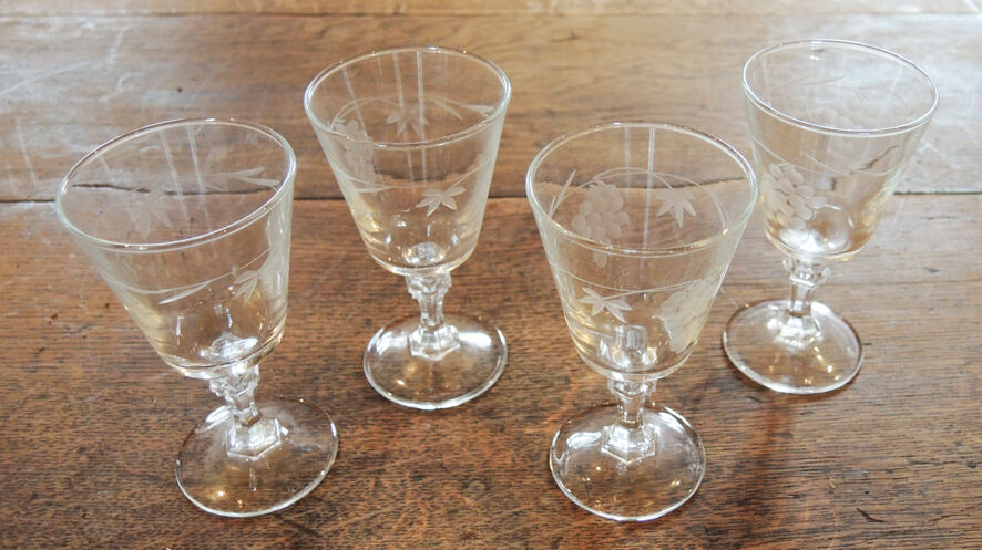 4 old digestive glasses decorated with vines