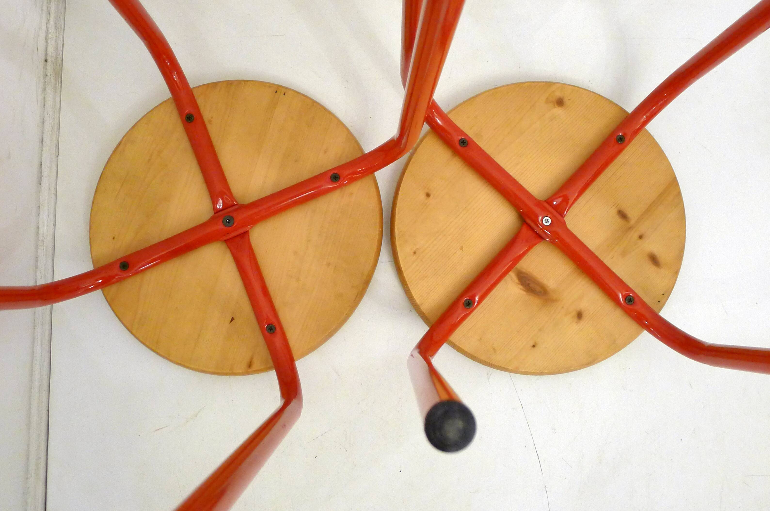 Pair of stools, red lacquered legs & wooden seat 1980s