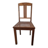 Wooden and cane chair. Carved wooden chair with cane seat.