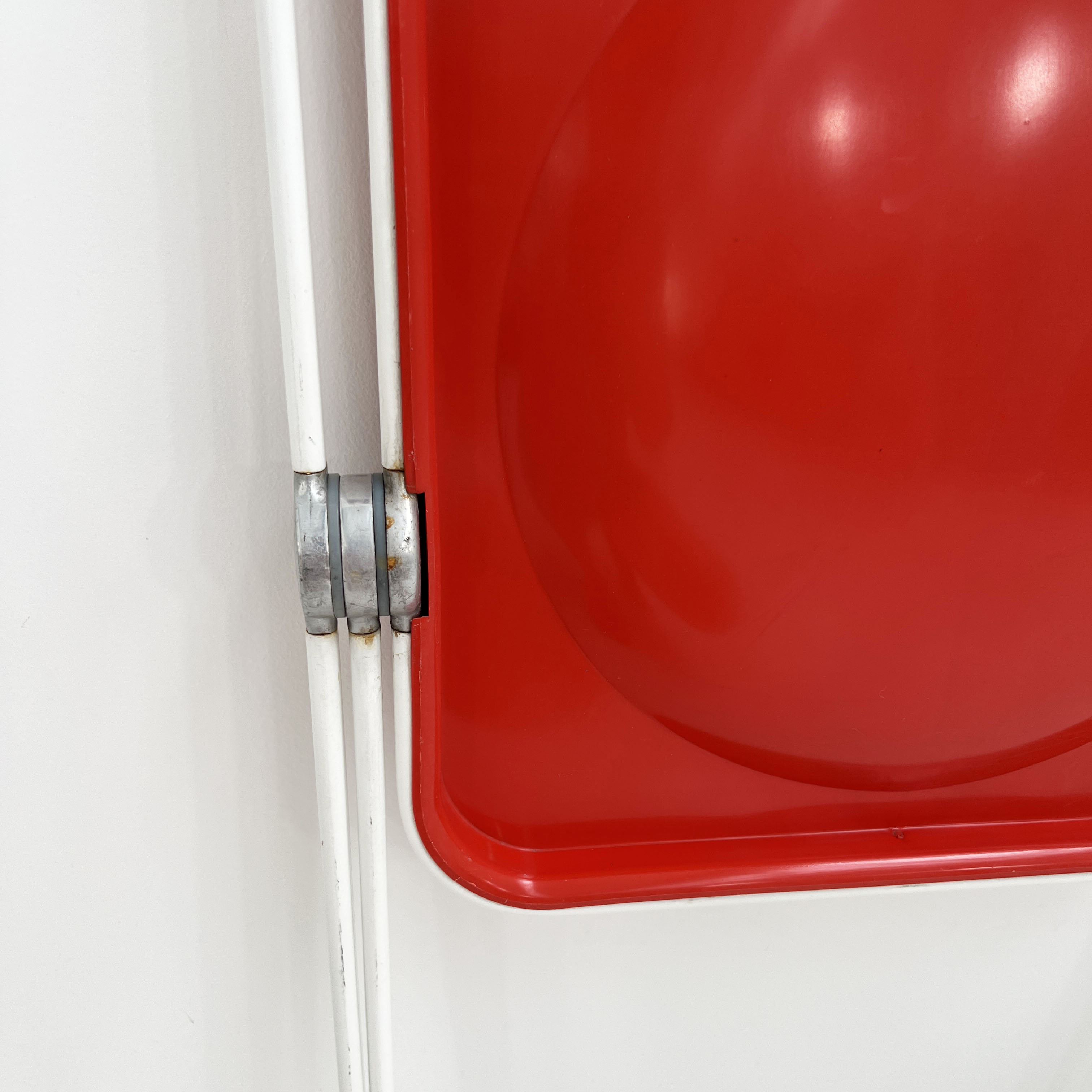 Red and white plia chair by giancarlo piretti for castelli, 1960