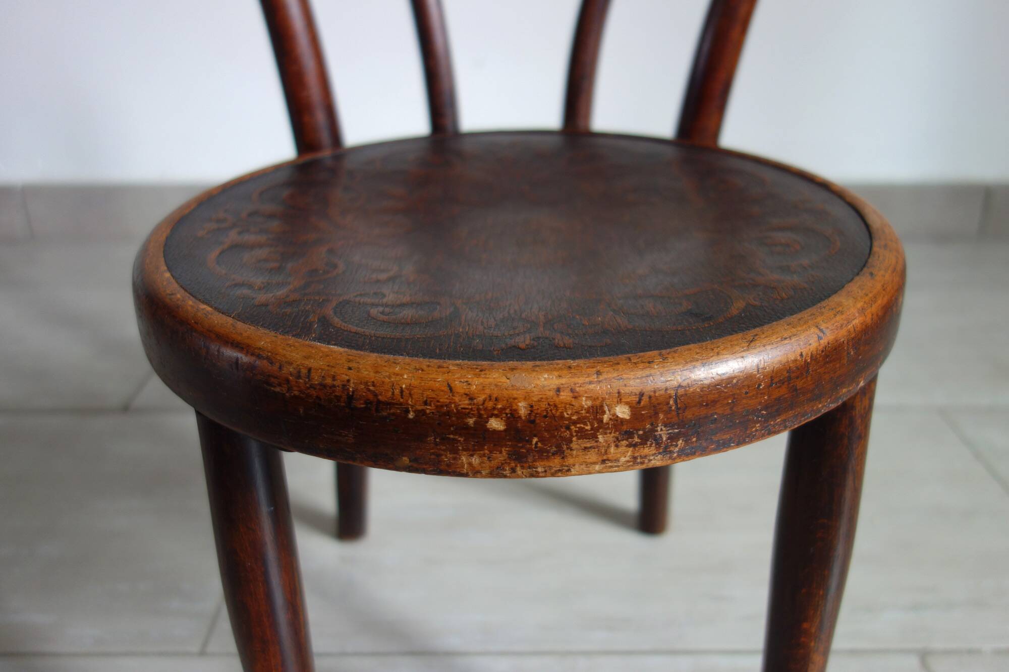 Antique curved wooden children's chair by Fischel, early 20th century.