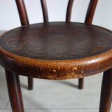 Antique curved wooden children's chair by Fischel, early 20th century.