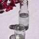 Carafe and glass made of blown and engraved glass.