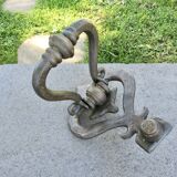 Impressive door knocker from the High Middle Ages in solid bronze.