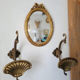 Oval mirror in gilded wood, 31x21 cm