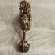 Golden bronze coat hook, 19th century