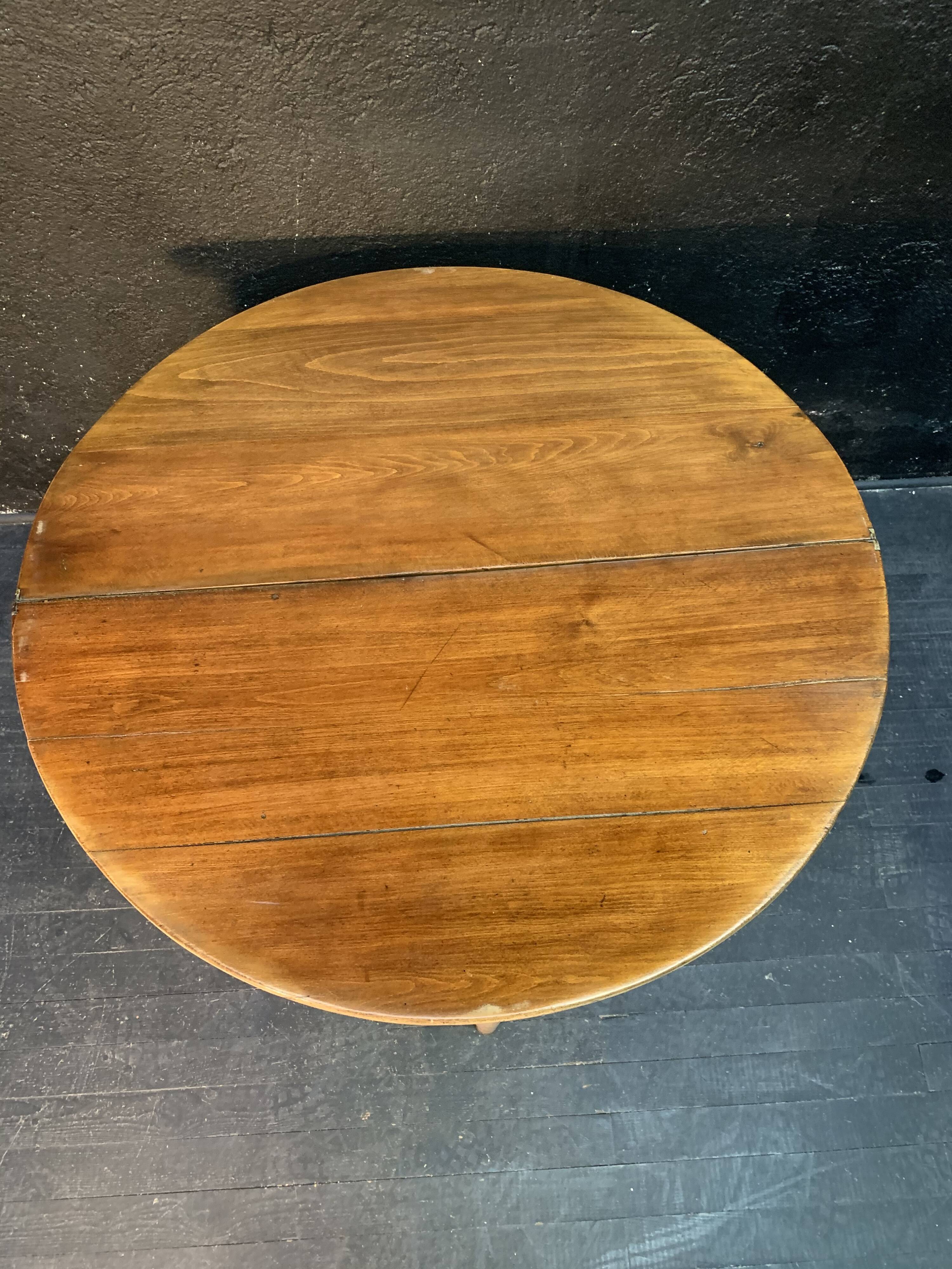 Former Louis XVI-style half moon table 19th century