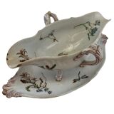 Gravy boat with its Luneville frame