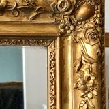 Miroir ancien à moulures dorées