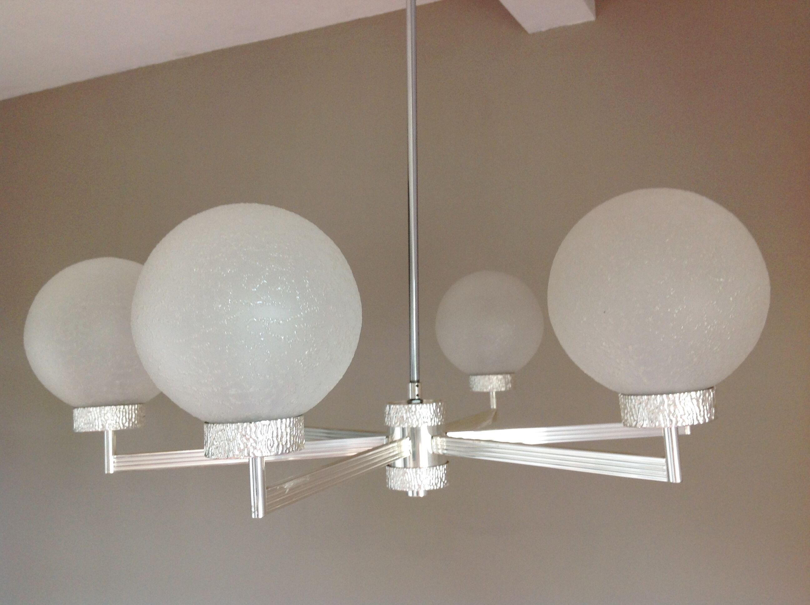 Six-light chrome metal chandelier and opaque glass globes / vintage 60s and 70s