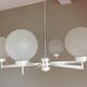 Six-light chrome metal chandelier and opaque glass globes / vintage 60s and 70s