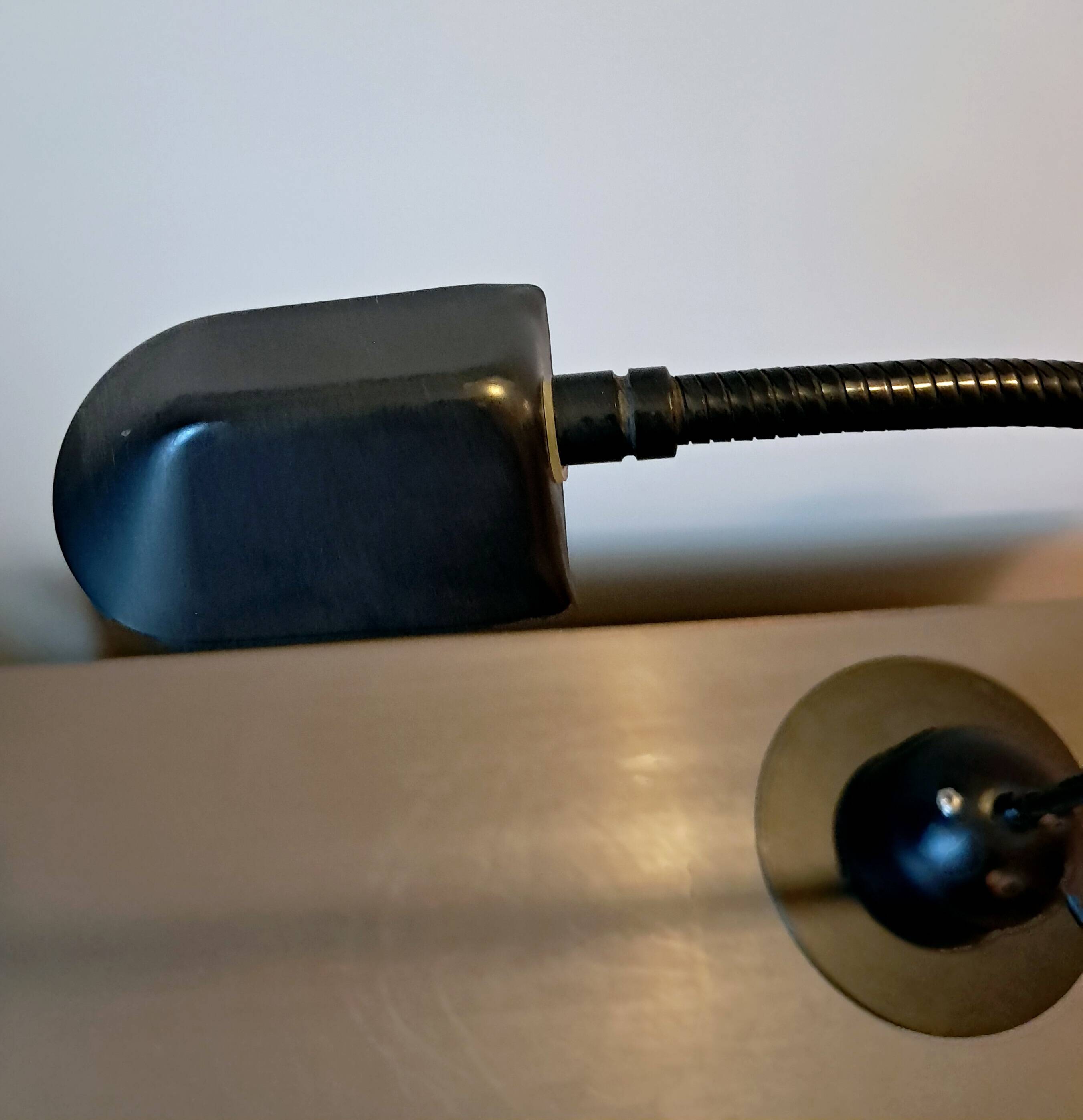 Articulated lamp in black metal. 80s