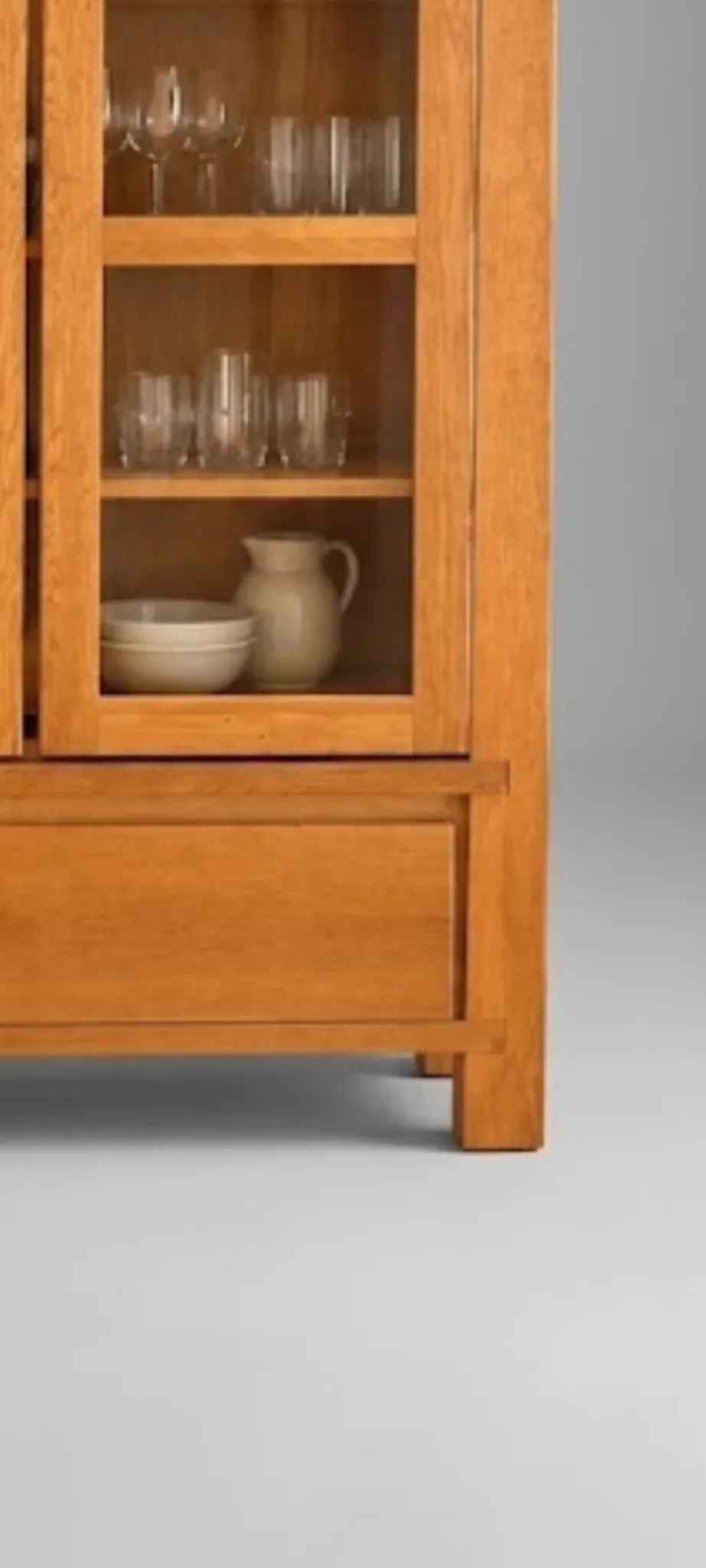 Glass display cabinet on legs