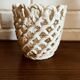 Woven earthenware pot