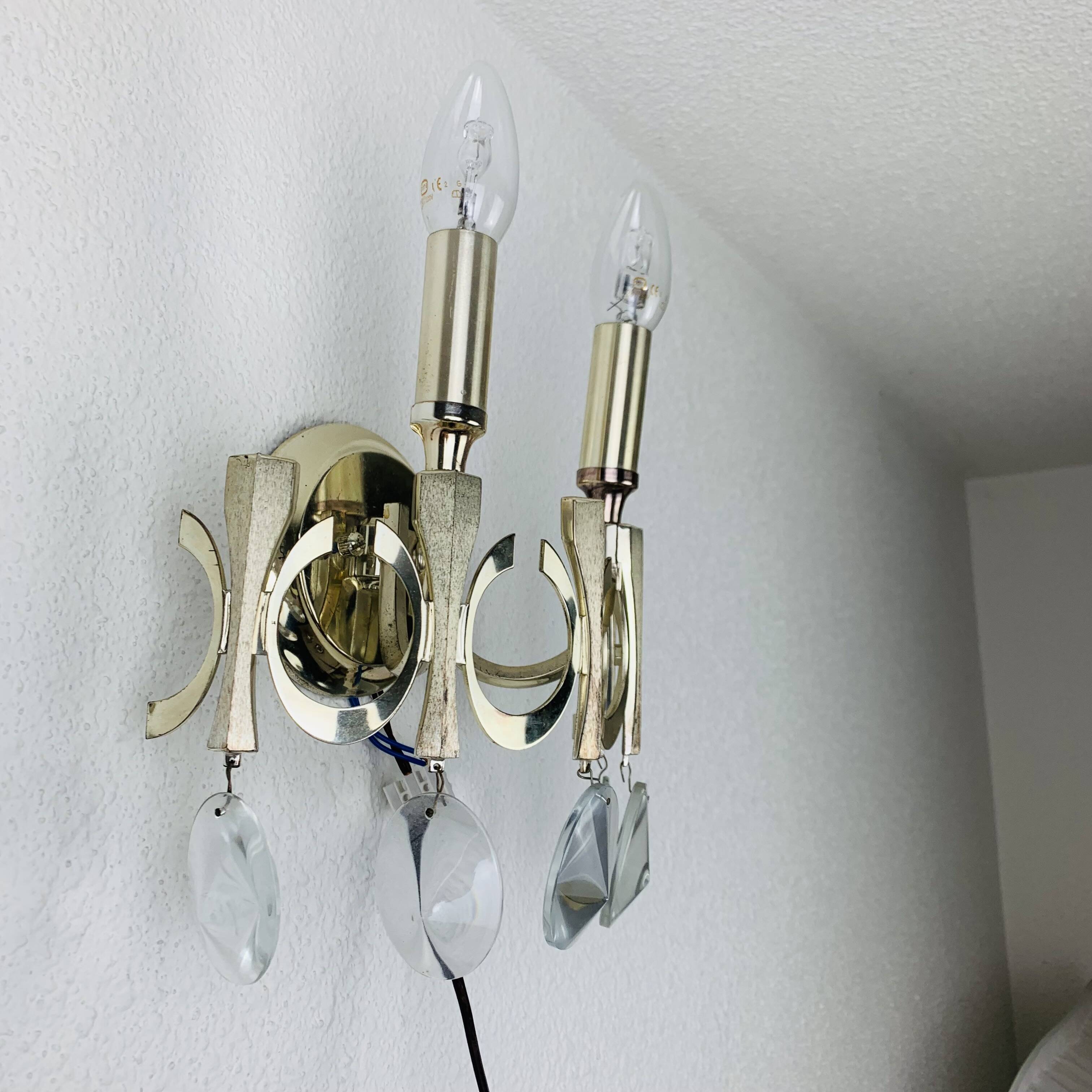 Pair of Ovali wall lights by Sciolari 70s