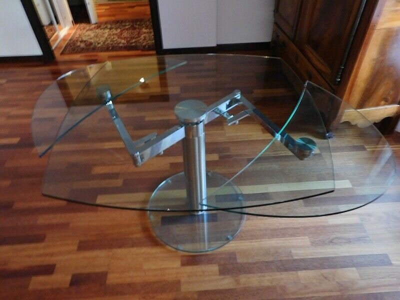 Glass and stainless steel dining table with 2-length system