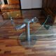 Glass and stainless steel dining table with 2-length system