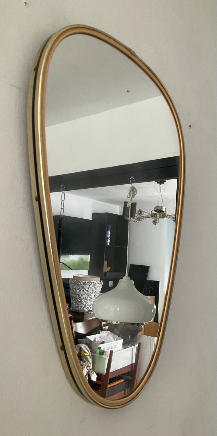 Asymmetrical free-form mirror from the 60s and 70s