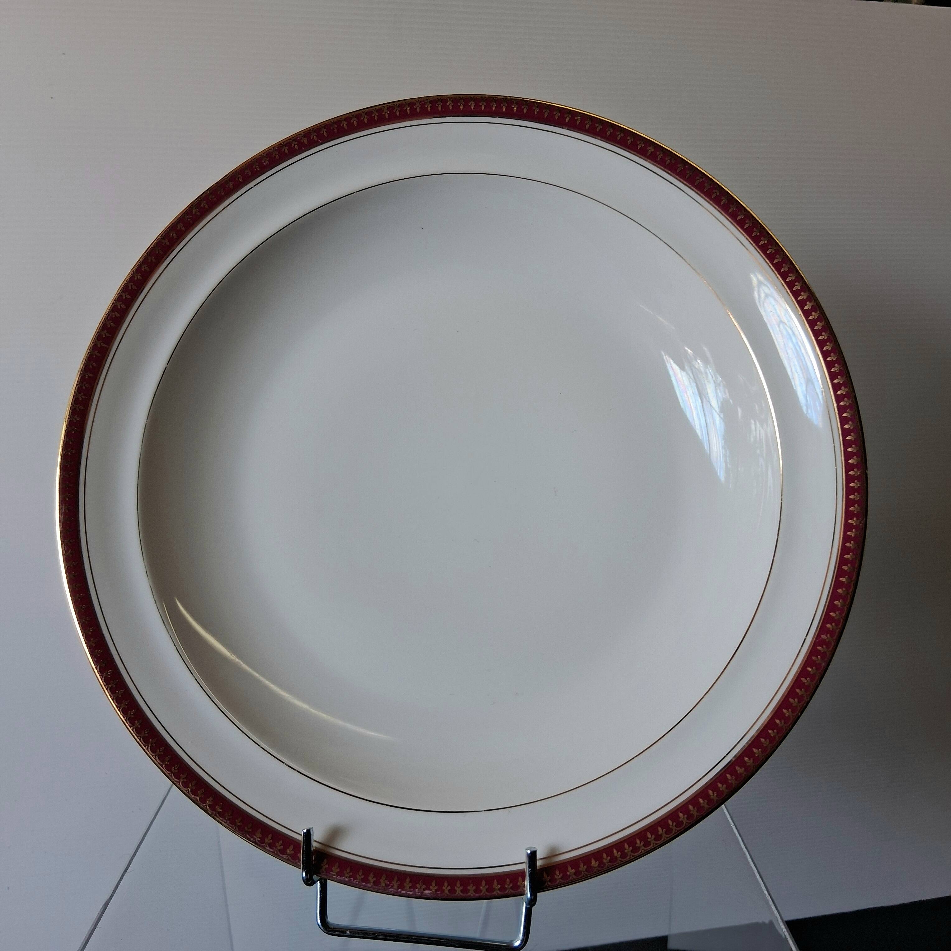 Round hollow serving plate in porcelain from Chastagner et Cie in good condition.